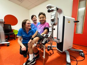 PCHF ambassador Cyrus with robotic arm