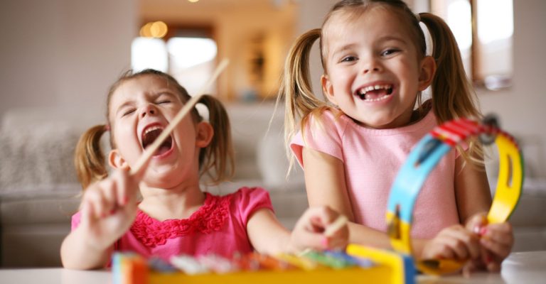 Two young girls with instrucments